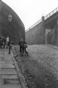 Newcastle Workers May 1954 Print: Bicycles Up the Hill