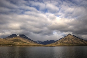 Picturesque Svalbard coastline fjord and mountains Picturesque Svalbard coastline fjord and mountains