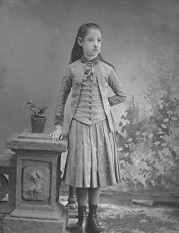 <b class=qtipBold><figcaption>Pleats & Boots</figcaption></b><br>circa 1885: Full-length studio portrait of a girl in a skirt and buttoned vest posing in a photographer's studio, Paterson, New Jersey. (Photo by Hulton Archive/Getty Images) Pleats & Boots