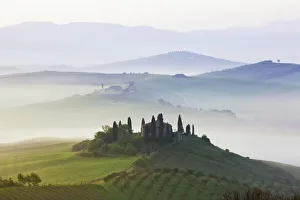 Podere Belvedere in the morning fog, San Quirico, Val dOrcia, Tuscany, Italy, Europe Podere Belvedere in the morning fog, San Quirico, Val dOrcia, Tuscany, Italy, Europe