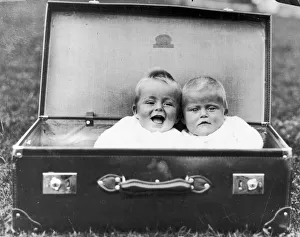 <b class=qtipBold><figcaption>Portable Family</figcaption></b><br>Two babies packed into a large suitcase, circa 1930. (Photo by FPG/Hulton Archive/Getty Images)<br><em>© 2004 Getty Images</em> Portable Family