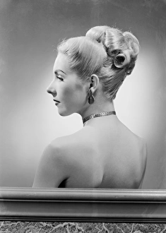 Profile of elegant mid adult woman, studio shot Profile of elegant mid adult woman, studio shot