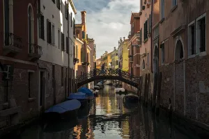 <b class=qtipBold><figcaption>Quiet Venice Canal</figcaption></b><br>A man strolls across a bridge in a quiet corner of Venice, Italy.<br><em>© 2016 Chase Dekker Wild-Life Images</em> Quiet Venice Canal
