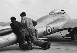 Position Gallery: RAF De Havilland Vampire being pushed into position ready for take-off