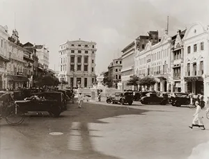 <b class=qtipBold><figcaption>Raffles Place</figcaption></b><br>A view across Raffles Place towards the Mercantile Bank of India (centre, left), Singapore, circa 1925. (Photo by Hulton Archive/Getty Images)<br><em>© 2011 Getty Images</em> Raffles Place
