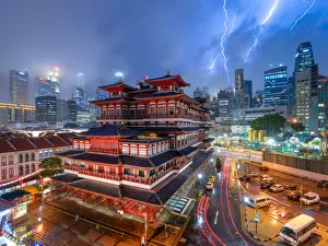 <b class=qtipBold><figcaption>Raikou</figcaption></b><br>Lightning storm over Buddha's Tooth Relic Temple in Chinatown during a heavy downpour in the evening, Singapore.<br><em>© Jon Chiang Photography</em> Raikou