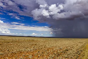Rain front approaching at Helmeringshausen on road D707, south of Namibia, Africa Rain front approaching at Helmeringshausen on road D707, south of Namibia, Africa