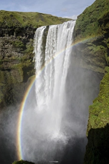 Rainbow, Skogafoss waterfall on the Skoga river, ring road, Suourland, Sudurland Rainbow, Skogafoss waterfall on the Skoga river, ring road, Suourland, Sudurland