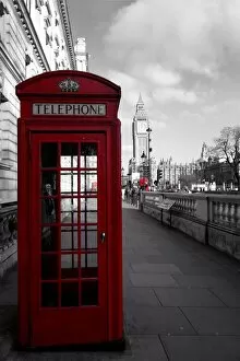 Red phone booth in central London with Big Ben in the background