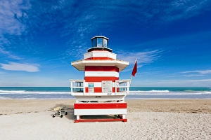 Red and white striped lifeguard hut stylized as lighthouse in South Beach, Miami, Florida Red and white striped lifeguard hut stylized as lighthouse in South Beach, Miami, Florida