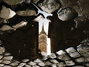 Reflection of the church in puddle, Rome, Italy Reflection of the church in puddle, Rome, Italy