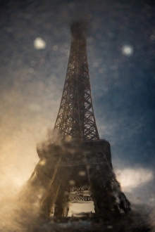 Reflection of Eiffel tower on the wet road Reflection of Eiffel tower on the wet road