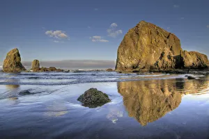 Reflection of Haystack Rock at Cannon Beach Reflection of Haystack Rock at Cannon Beach