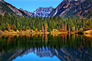 Reflection of Mt Chikamin Peak in Gold lake, Fall Snoqualmie Pass, Wenatchee National Forest Wilderness Reflection of Mt Chikamin Peak in Gold lake, Fall Snoqualmie Pass, Wenatchee National Forest Wilderness