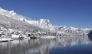 Reflection of snowcapped mountain in water, Backenstein Mountain, Ausseerland, Salzkammergut, Styria, Austria Reflection of snowcapped mountain in water, Backenstein Mountain, Ausseerland, Salzkammergut, Styria, Austria