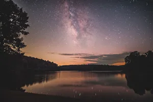 <b class=qtipBold><figcaption>Reflections of time</figcaption></b><br>Reflections of time with the milky way at Price lake shot in Blowing Rock, NC.<br><em>© ROBERT LOE</em> Reflections of time