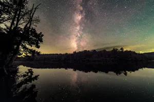 <b class=qtipBold><figcaption>Reflections of the Universe</figcaption></b><br>Reflections of the Universe at Price Lake located off the Blue Ridge Parkway in North Carolina.<br><em>© ROBERT LOE</em> Reflections of the Universe