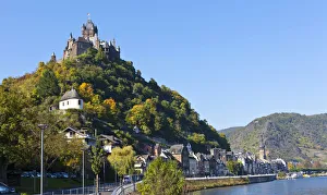 The Reichsburg Cochem castle in Cochem on the Moselle, Rhineland-Palatinate, Germany The Reichsburg Cochem castle in Cochem on the Moselle, Rhineland-Palatinate, Germany