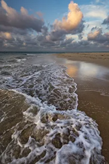 Remote sandy beach on uninhabited island with incoming tide, Pacific Islands, Tonga Remote sandy beach on uninhabited island with incoming tide, Pacific Islands, Tonga