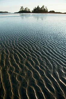 Ripples Form In The Sand At Chestermans Beach And Frank Island Near Tofino; British Columbia Canada Ripples Form In The Sand At Chestermans Beach And Frank Island Near Tofino; British Columbia Canada