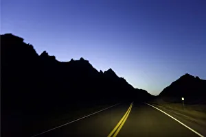 Road through sandstone buttes, night (blurred motion) Road through sandstone buttes, night (blurred motion)