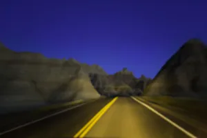 Road through sandstone buttes, night (defocused) Road through sandstone buttes, night (defocused)