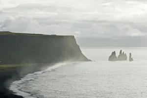 Rock formations of Reynisdrangar and Reynisfjall Mountain, Dyrholaey, Vik i Myrdal, Southern Region, Iceland Rock formations of Reynisdrangar and Reynisfjall Mountain, Dyrholaey, Vik i Myrdal, Southern Region, Iceland