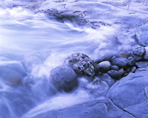Rocks are shaped in a pool, pool with rocks, surf zone, water in motion, Burren Coast Rocks are shaped in a pool, pool with rocks, surf zone, water in motion, Burren Coast