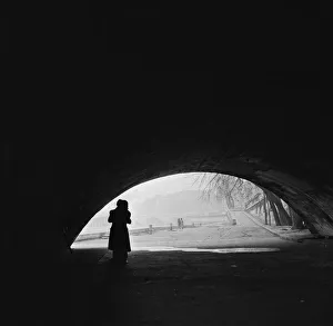 <b class=qtipBold><figcaption>Romantic Paris</figcaption></b><br>A courting couple kissing under a bridge on the bank of the Seine, Paris, 1954. (Photo by Fred Van Schagen/BIPs/Hulton Archive/Getty Images)<br><em>© 2011 Getty Images</em> Romantic Paris