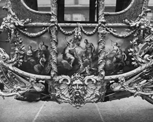 <b class=qtipBold><figcaption>Royal Carriage</figcaption></b><br>19th March 1953: The intricate decoration on the State Coach that will take the Queen to Westminster Abbey for the coronation. The coach has been painstakingly restored, retiled and prepared for the great occaision. (Photo by Central Press/Getty Images) Royal Carriage