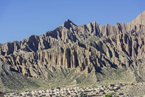 Rugged mountain and a planned settlement, social housing, Tilcara, Jujuy Province Rugged mountain and a planned settlement, social housing, Tilcara, Jujuy Province