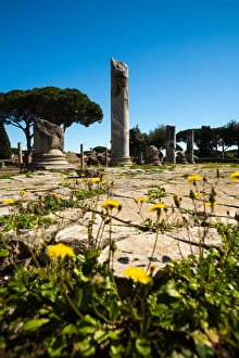 The ruins of the Forum in the Ancient Roman harbour city of Ostia Antica in Rome, Italy The ruins of the Forum in the Ancient Roman harbour city of Ostia Antica in Rome, Italy