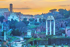 The ruins of Temple of Castor and Pollux and Arch of Titus at dawn in the Roman Forum, Rome, Italy The ruins of Temple of Castor and Pollux and Arch of Titus at dawn in the Roman Forum, Rome, Italy