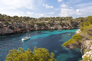Sailing boat in the bay, Cala Pi, Majorca, Balearic Islands, Spain Sailing boat in the bay, Cala Pi, Majorca, Balearic Islands, Spain