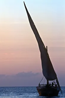 <b class=qtipBold><figcaption>Sailing Dhow at Sunset</figcaption></b><br>Tanzania, Zanzibar Archipelago, Unguja, sailing dhow at sunset<br><em>© © John Seaton Callahan</em> Sailing Dhow at Sunset