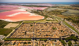Salines and the historic centre in the quadrilateral of Aigues-Mortes, Camargue, Languedoc-Roussillon, France Salines and the historic centre in the quadrilateral of Aigues-Mortes, Camargue, Languedoc-Roussillon, France
