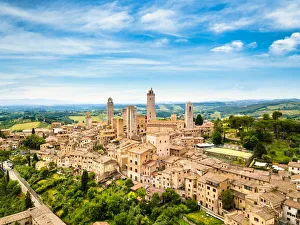 San Gimignano from above, aerial view from town to country. Tuscany, Italy San Gimignano from above, aerial view from town to country. Tuscany, Italy