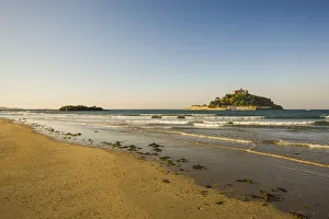 Sand beach with the island of St. Michaels Mount at high tide, Marazion, Cornwall Sand beach with the island of St. Michaels Mount at high tide, Marazion, Cornwall