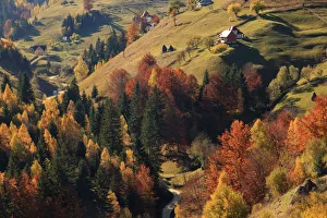 Scenic landscape of small village in mountains, Piatra Craiului National Park, Magura Scenic landscape of small village in mountains, Piatra Craiului National Park, Magura
