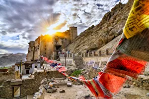 Scenic of leh palace with colorful omani prayer flag with dramatic sky in leh ladakh Scenic of leh palace with colorful omani prayer flag with dramatic sky in leh ladakh