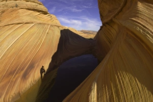 Shadow of man photographing scenic sandstone Shadow of man photographing scenic sandstone