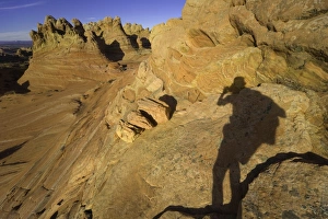 Shadow of man taking photograph of scenery Shadow of man taking photograph of scenery