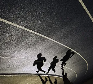 Shadow of a runner on a running track available as Framed Prints, Photos,  Wall Art and Photo Gifts