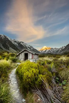 Shelter at Hooker Valley track with Mount Cook as background at Aoraki Mount Cook Shelter at Hooker Valley track with Mount Cook as background at Aoraki Mount Cook