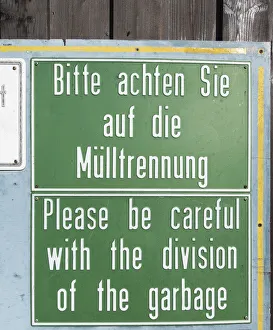 Sign in German and English Bitte achten Sie auf die Mulltrennung, Please be careful with the division of the garbage Sign in German and English Bitte achten Sie auf die Mulltrennung, Please be careful with the division of the garbage
