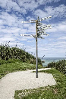 Signpost at Far-Away-Point, Tauranga Bay, Cape Foulwind, South Island, New Zealand Signpost at Far-Away-Point, Tauranga Bay, Cape Foulwind, South Island, New Zealand