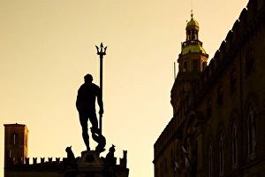Silhouette of Neptune Statue at sunset in Bologna, Emilia-Romagna, Italy Silhouette of Neptune Statue at sunset in Bologna, Emilia-Romagna, Italy