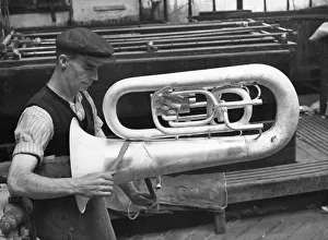 <b class=qtipBold><figcaption>Silver Polish</figcaption></b><br>circa 1905: An instrument that has been taken from the plating bath, shortly to be polished with silver sand and water to give it a beautiful silver finish. (Photo by Hulton Archive/Getty Images) Silver Polish
