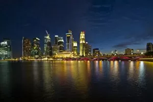 Images Dated 28th August 2010: Singapore city skyline at blue hour
