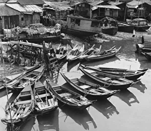 <b class=qtipBold><figcaption>Singapore River Boats</figcaption></b><br>Boats moored on Singapore River, Singapore, circa 1955. (Photo by Siegfried Sammer/Three Lions/Hulton Archive/Getty Images)<br><em>© 2011 Getty Images</em> Singapore River Boats